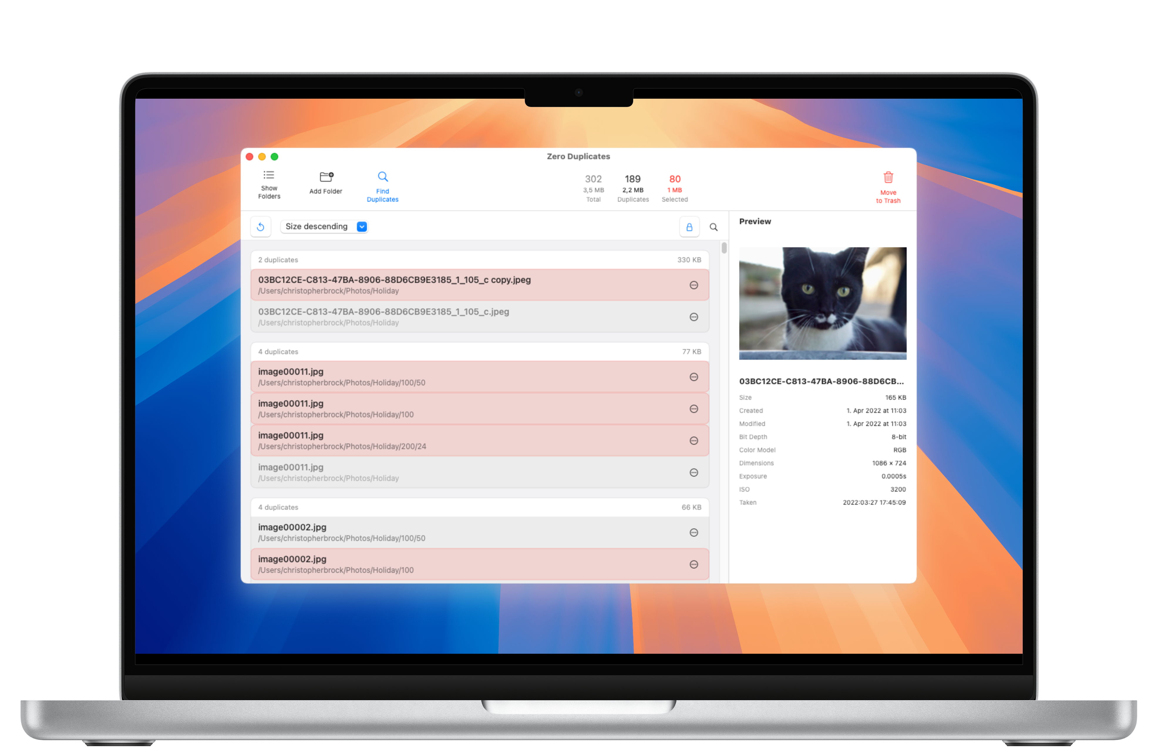 MacBook Pro mockup showing Zero Duplicates for Mac with duplicate file detection interface